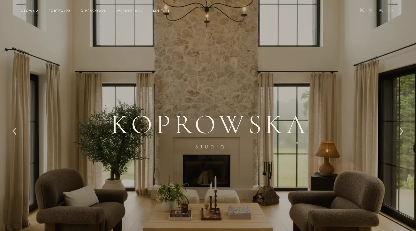 Koprowska Studio homepage with a full-screen interior photo slider
