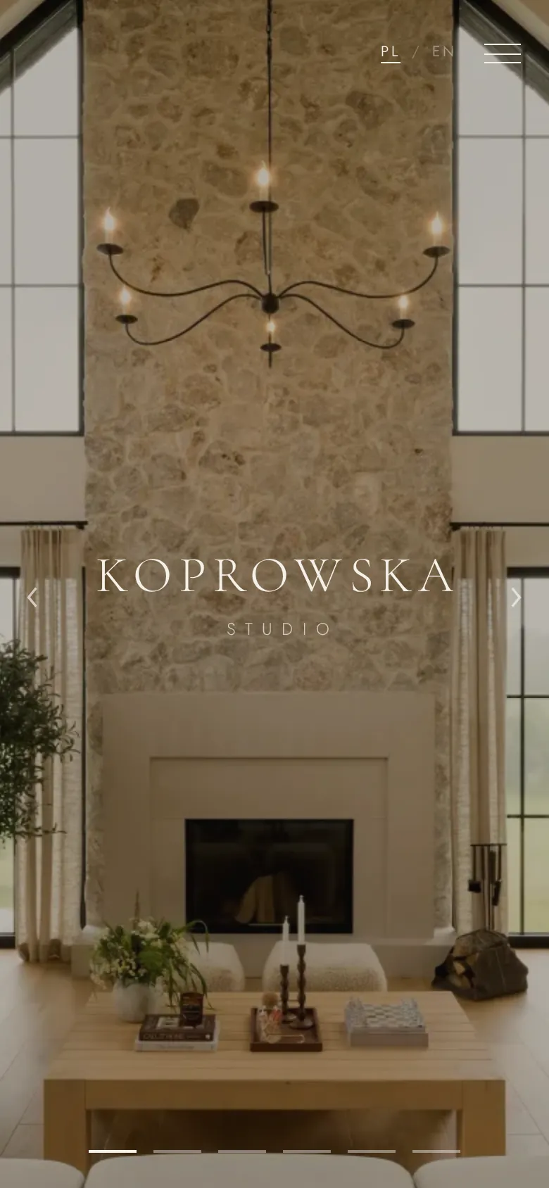 Koprowska Studio homepage on a mobile phone